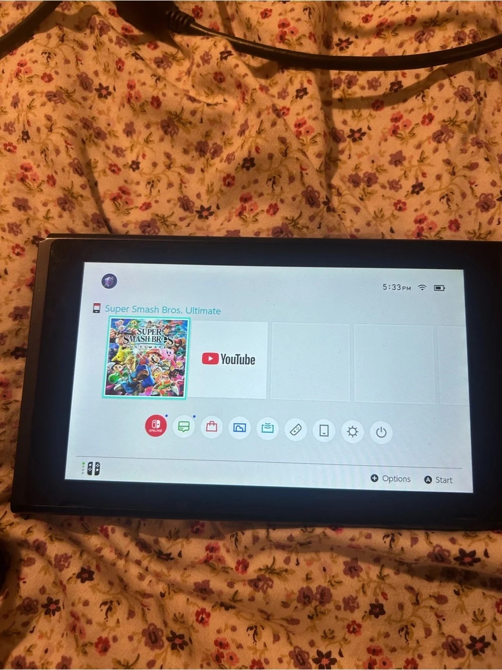 Nintendo Switch with Neon Red/Blue Joy‑Con and Blue Themed Controllers